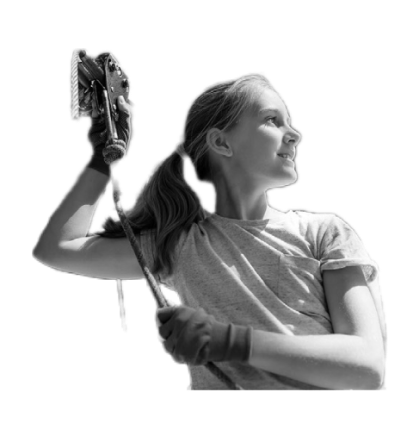 A girl setting up for rock climbing